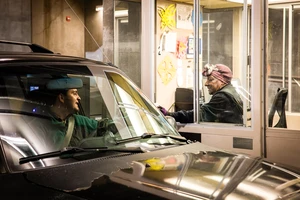 A vehicle entering a parking garage.