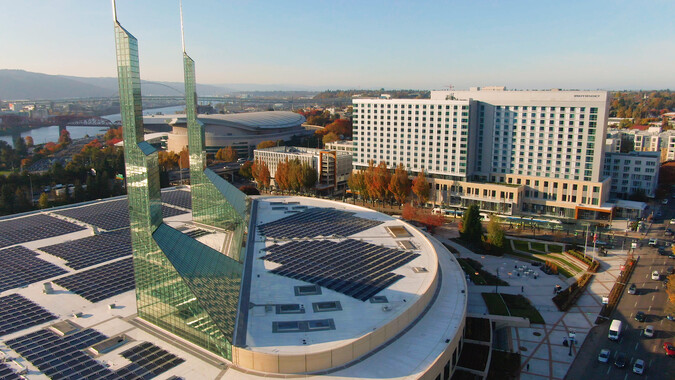 Aerial view of the OCC roof with spires and solar panels.
