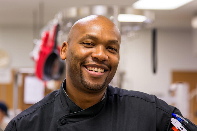 Headshot of Chef Allan Wambaa