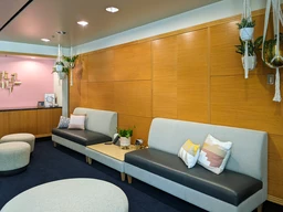 Modern seating area with gray couches.